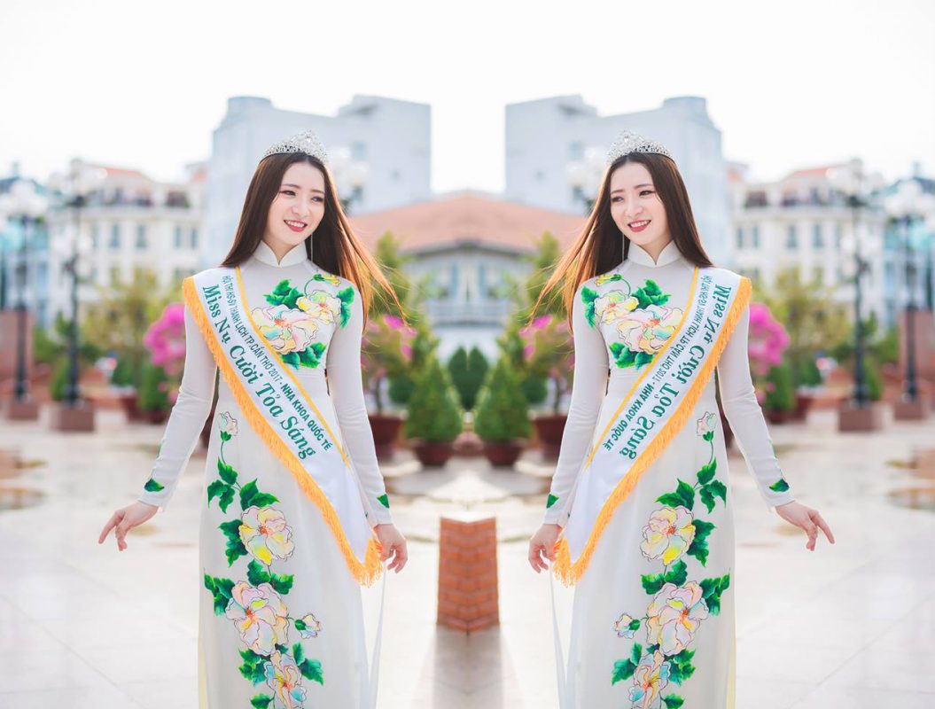 Model Nguyễn Nhật Thảo đẹp tinh khôi thả dáng với áo dài trắng trên phố đón xuân